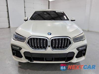 Piąte zdjęcie samochodu w środku: 2021 BMW X6 M50I VIN:5UXCY8C04M9E21187 - miniatura