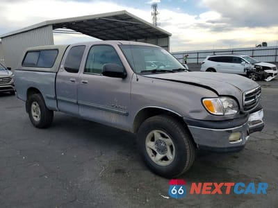 Czwarte zdjęcie samochodu z boku: 2000 TOYOTA TUNDRA SR5 VIN:5TBRT3411YS034310 - miniatura