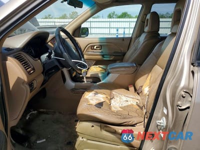 Zdjęcie 7 z 14 samochodu: 2004 HONDA PILOT VIN:2HKYF18674H512086 - miniatura