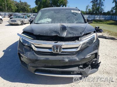 Piąte zdjęcie samochodu w środku: 2022 HONDA PILOT EXL VIN:5FNYF5H5XNB006475 - miniatura