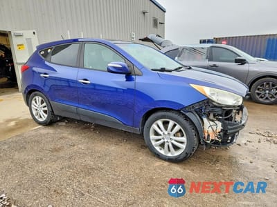 Czwarte zdjęcie samochodu z boku: 2012 HYUNDAI TUCSON LIMITED VIN:KM8JUCAC8CU433710 - miniatura