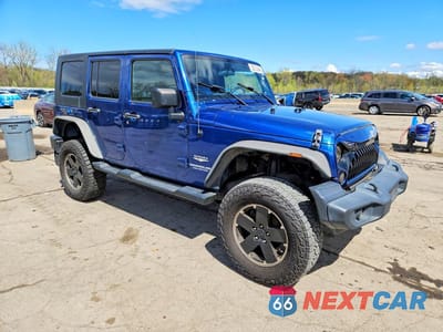 Czwarte zdjęcie samochodu z boku: 2009 JEEP WRANGLER UNLIMITED SAHARA VIN:1J8GA59199L715254 - miniatura