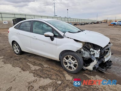 Czwarte zdjęcie samochodu z boku: 2014 FORD FIESTA SE VIN:3FADP4BJ6EM225852 - miniatura