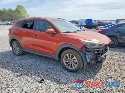 Czwarte zdjęcie samochodu z boku: 2016 HYUNDAI TUCSON SE VIN:KM8J33A48GU104703 - miniatura