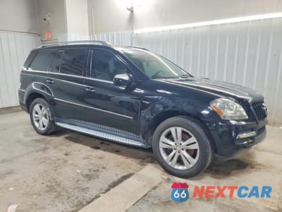 Czwarte zdjęcie samochodu z boku: 2010 MERCEDES-BENZ GL 350 BLUETEC VIN:4JGBF2FE0AA552885 - miniatura