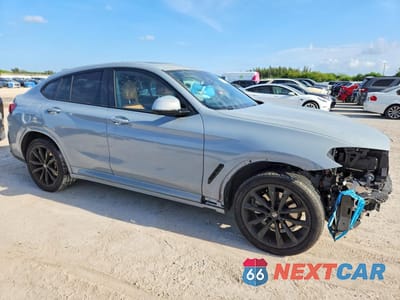 Czwarte zdjęcie samochodu z boku: 2024 BMW X4 VIN:5UX33DT09R9U40913 - miniatura