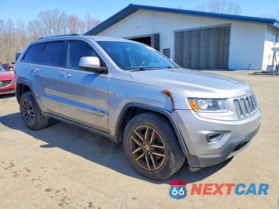 Czwarte zdjęcie samochodu z boku: 2014 JEEP GRAND CHEROKEE LAREDO VIN:1C4RJFAG0EC210221 - miniatura
