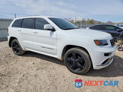 Czwarte zdjęcie samochodu z boku: 2016 JEEP GRAND CHEROKEE OVERLAND VIN:1C4RJFCG3GC338405 - miniatura
