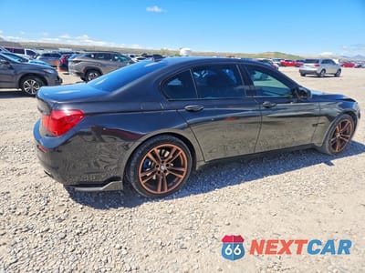 Trzecie zdjęcie samochodu z tyłu: 2012 BMW 740 I VIN:WBAKA4C51CDS99402 - miniatura