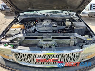 Zdjęcie 11 z 11 samochodu: 2003 GMC YUKON DENALI VIN:1GKEK63U83J327489 - miniatura