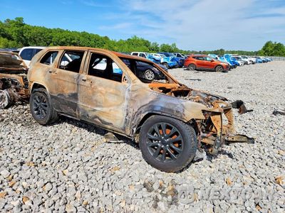 Czwarte zdjęcie samochodu z boku: 2022 JEEP GRAND CHEROKEE LAREDO E VIN:1C4RJFAG2NC149261 - miniatura