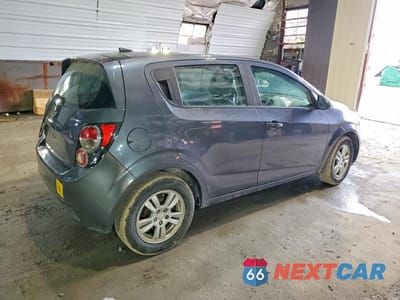 Trzecie zdjęcie samochodu z tyłu: 2012 CHEVROLET SONIC LS VIN:1G1JB6SH3C4189141 - miniatura