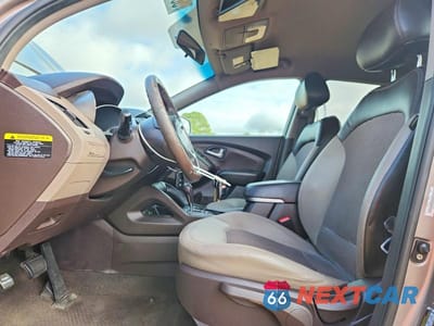 Zdjęcie 7 z 12 samochodu: 2012 HYUNDAI TUCSON GLS VIN:KM8JU3AC9CU422585 - miniatura