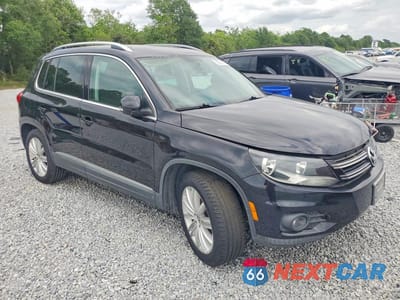 Czwarte zdjęcie samochodu z boku: 2012 VOLKSWAGEN TIGUAN S VIN:WVGAV7AX6CW531176 - miniatura