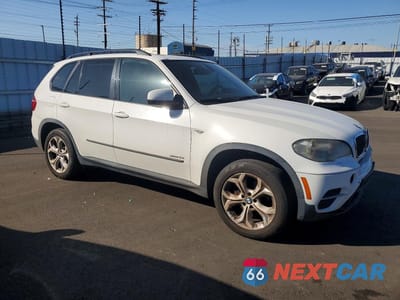 Czwarte zdjęcie samochodu z boku: 2011 BMW X5 XDRIVE35I VIN:5UXZV4C56BLL58307 - miniatura