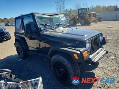 Czwarte zdjęcie samochodu z boku: 2000 JEEP WRANGLER / TJ SPORT VIN:1J4FA49S7YP778103 - miniatura