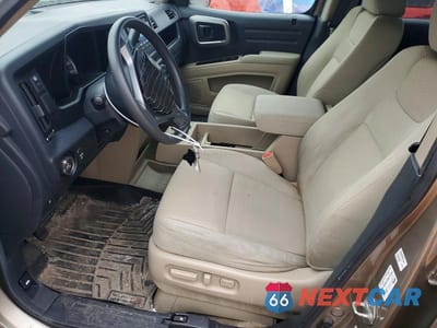 Zdjęcie 7 z 12 samochodu: 2010 HONDA RIDGELINE RTS VIN:5FPYK1F43AB010318 - miniatura