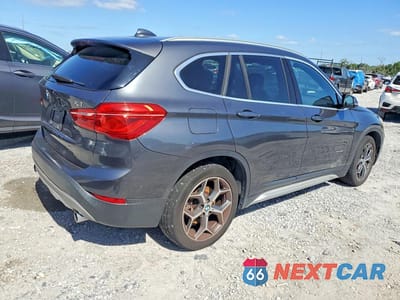 Trzecie zdjęcie samochodu z tyłu: 2018 BMW X1 XDRIVE28I VIN:WBXHT3C3XJ5K23316 - miniatura