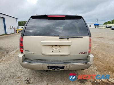 Zdjęcie 6 z 14 samochodu: 2011 GMC YUKON DENALI VIN:1GKS1EEFXBR220295 - miniatura