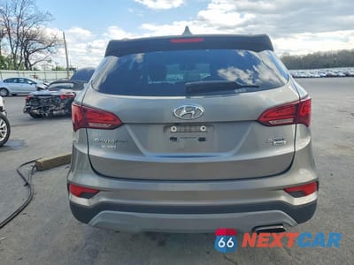 Zdjęcie 6 z 13 samochodu: 2018 HYUNDAI SANTA FE SPORT 2.4L VIN:5NMZUDLB6JH105028 - miniatura
