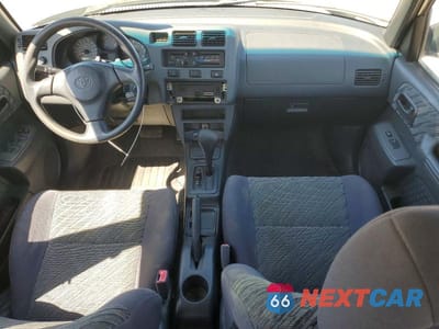 Zdjęcie 8 z 14 samochodu: 1999 TOYOTA RAV4 VIN:JT3HP10V2X7128567 - miniatura