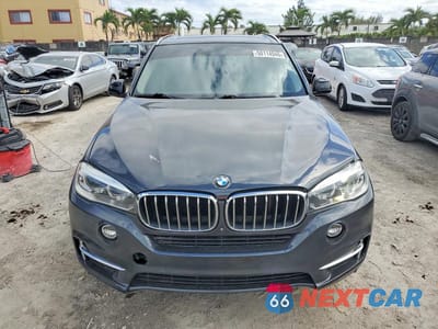 Piąte zdjęcie samochodu w środku: 2014 BMW X5 SDRIVE35I VIN:5UXKR2C5XE0H31965 - miniatura