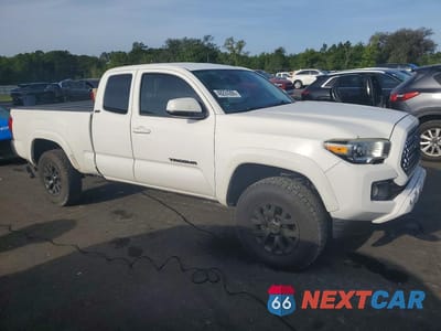 Czwarte zdjęcie samochodu z boku: 2019 TOYOTA TACOMA SR5 V6 VIN:5TFSZ5AN5KX196579 - miniatura