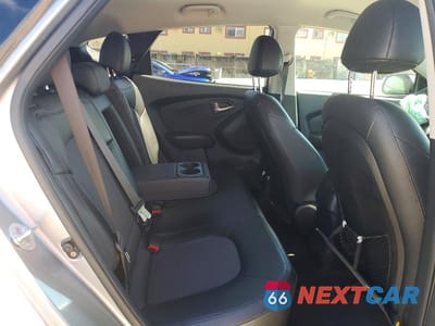 Zdjęcie 11 z 13 samochodu: 2012 HYUNDAI TUCSON GLS VIN:KM8JU3AC6CU324419 - miniatura