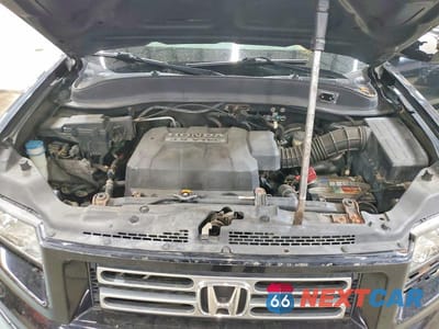 Zdjęcie 12 z 13 samochodu: 2006 HONDA RIDGELINE RTL VIN:2HJYK16536H549018 - miniatura