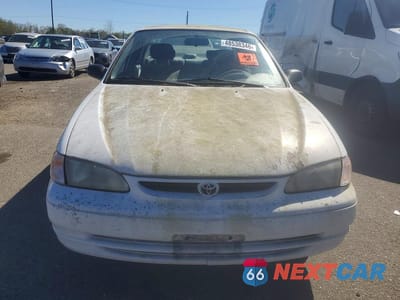 Piąte zdjęcie samochodu w środku: 1998 TOYOTA COROLLA CE VIN:1NXBR12E9WZ005126 - miniatura