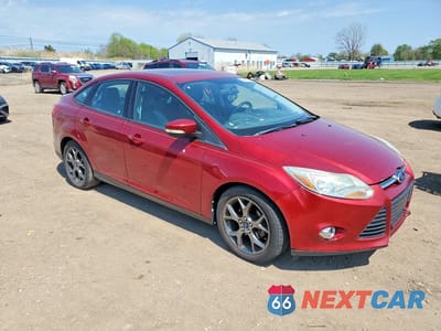 Czwarte zdjęcie samochodu z boku: 2013 FORD FOCUS SE VIN:1FADP3F21DL276382 - miniatura