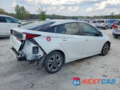 Trzecie zdjęcie samochodu z tyłu: 2021 TOYOTA PRIUS XLE VIN:JTDKAMFU9M3146912 - miniatura