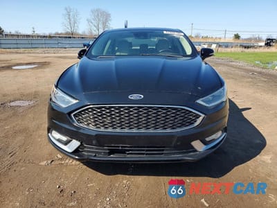 Piąte zdjęcie samochodu w środku: 2017 FORD FUSION TITANIUM VIN:3FA6P0D93HR273417 - miniatura