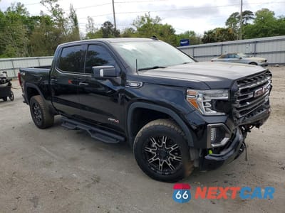 Czwarte zdjęcie samochodu z boku: 2020 GMC SIERRA K1500 AT4 VIN:3GTU9EETXLG418735 - miniatura