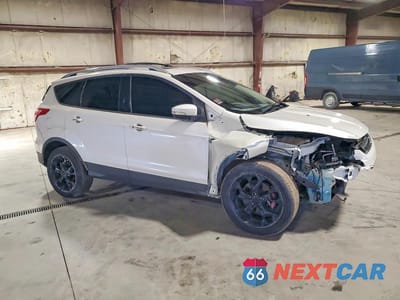Czwarte zdjęcie samochodu z boku: 2014 FORD ESCAPE TITANIUM VIN:1FMCU9J98EUA73034 - miniatura