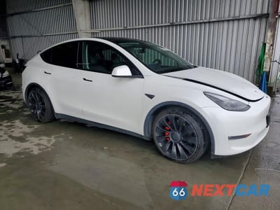 Czwarte zdjęcie samochodu z boku: 2022 TESLA MODEL Y VIN:7SAYGDEF1NF492701 - miniatura