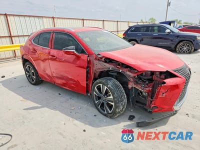Czwarte zdjęcie samochodu z boku: 2023 LEXUS UX 250H PREMIUM VIN:JTHP6JBH2P2148542 - miniatura