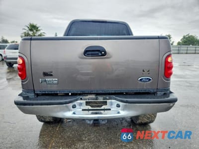 Zdjęcie 6 z 12 samochodu: 2002 FORD F150 SUPERCREW VIN:1FTRW08L62KC86464 - miniatura