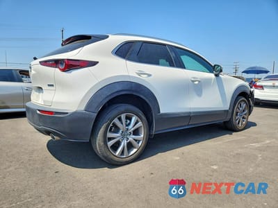 Trzecie zdjęcie samochodu z tyłu: 2023 MAZDA CX-30 PREFERRED VIN:3MVDMBCM9PM588387 - miniatura