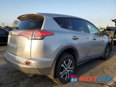 Trzecie zdjęcie samochodu z tyłu: 2018 TOYOTA RAV4 LE VIN:JTMZFREV1JJ197481 - miniatura