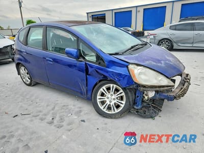 Czwarte zdjęcie samochodu z boku: 2009 HONDA FIT SPORT VIN:JHMGE88609S060187 - miniatura