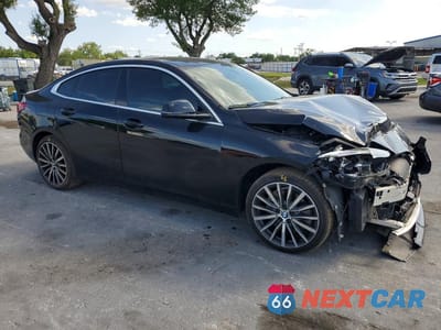 Czwarte zdjęcie samochodu z boku: 2021 BMW 228I VIN:WBA53AK05M7J35520 - miniatura