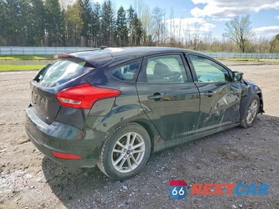 Trzecie zdjęcie samochodu z tyłu: 2015 FORD FOCUS SE VIN:1FADP3K2XFL202967 - miniatura