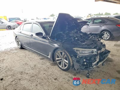 Czwarte zdjęcie samochodu z boku: 2019 BMW 750 I VIN:WBA7F0C52KGM24680 - miniatura