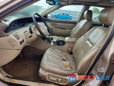 Zdjęcie 7 z 12 samochodu: 2002 TOYOTA AVALON XLS VIN:4T1BF28B32U266614 - miniatura