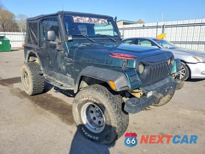 Czwarte zdjęcie samochodu z boku: 1999 JEEP WRANGLER / TJ SPORT VIN:1J4FY19S1XP424277 - miniatura