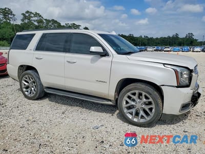 Czwarte zdjęcie samochodu z boku: 2019 GMC YUKON SLT VIN:1GKS1DKC3KR177035 - miniatura