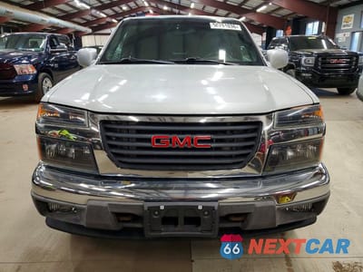 Piąte zdjęcie samochodu w środku: 2012 GMC CANYON SLE VIN:1GTH6MFE0C8137151 - miniatura