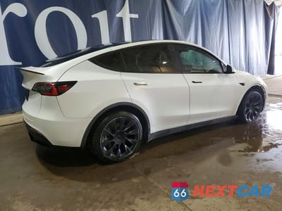 Trzecie zdjęcie samochodu z tyłu: 2022 TESLA MODEL Y VIN:7SAYGAEE0NF521885 - miniatura