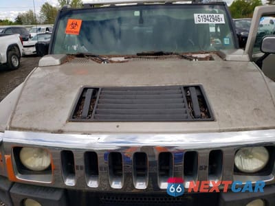 Zdjęcie 12 z 13 samochodu: 2004 HUMMER H2 VIN:5GRGN23U64H118618 - miniatura